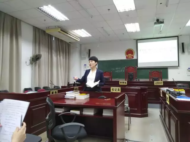 张楠楠律师应邀担任模拟法庭比赛评委